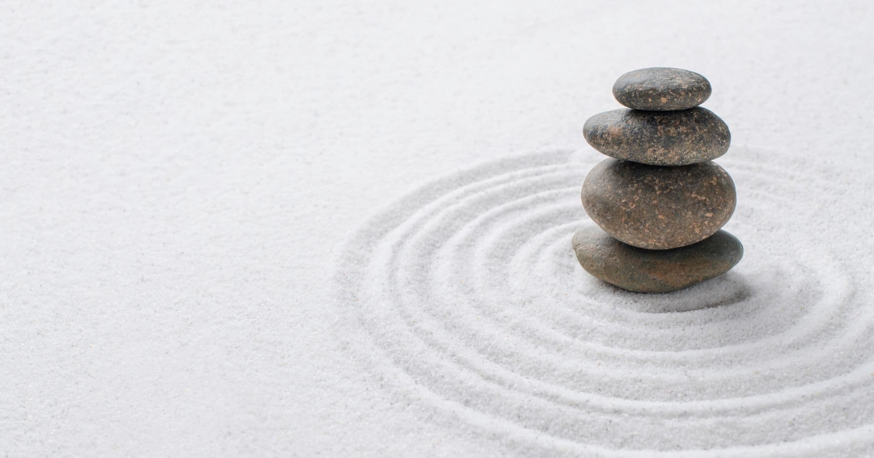 Peaceful wellness and meditation scene showing a person in a serene environment